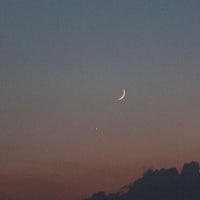 a crescent and a star in the sky