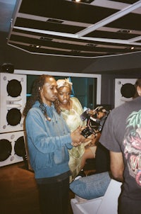 a group of people in a recording studio