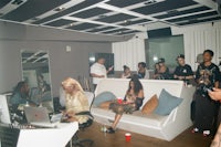 a group of people in a recording studio